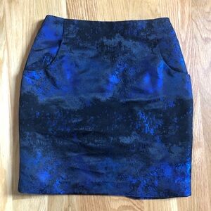 H&M Beautiful blue and black silky mini skirt with pockets size 4